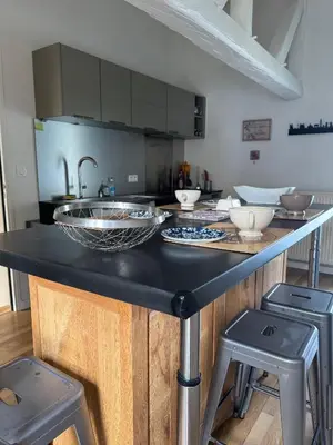 Cuisine ou kitchenette dans l'établissement Petite Villa de impasse du Prieure