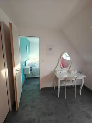 Un ou plusieurs lits dans un hébergement de l'établissement Maison 6 chambres avec piscine proche Cabourg