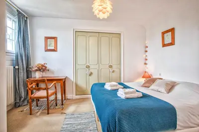 Un ou plusieurs lits dans un hébergement de l'établissement La Maison Fabane - Hypercentre de Carentan