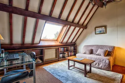 Coin salon dans l'établissement La Maison Fabane - Hypercentre de Carentan