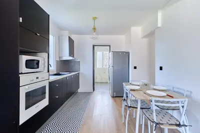 Cuisine ou kitchenette dans l'établissement Appartement Sérénité Normande - Welkeys