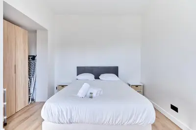 Un ou plusieurs lits dans un hébergement de l'établissement Appartement Évasion Normande - Welkeys