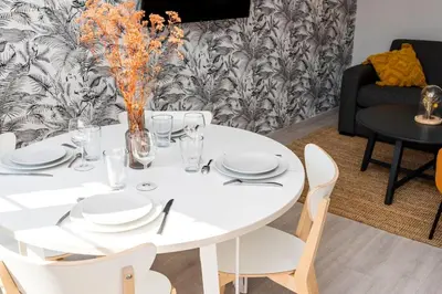 Coin salon dans l'établissement Beau duplex, proche zénith et palais des sports