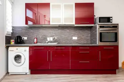 Cuisine ou kitchenette dans l'établissement Triplex 5 personnes au calme