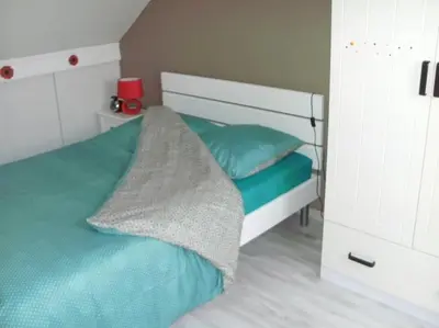 Un ou plusieurs lits dans un hébergement de l'établissement Gîte à 3min de Ste-Mère-Eglise