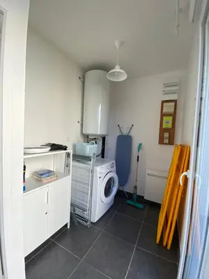 Cuisine ou kitchenette dans l'établissement La Maison du Lavoir