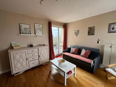 Coin salon dans l'établissement Appartement résidence calme proche centre-ville