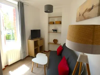 Télévision ou salle de divertissement dans l'établissement Maison en triplex au centre-ville de Cherbourg