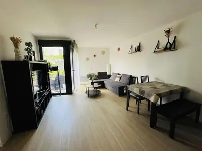 Cuisine ou kitchenette dans l'établissement Appartement spacieux avec terrasse
