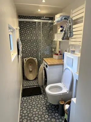 Salle de bains dans l'établissement Charmante maison Cabourgeaise