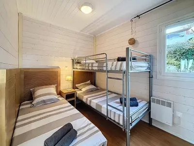 Un ou plusieurs lits dans un hébergement de l'établissement Chalet de la Butte aux Cerfs