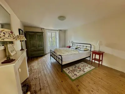 Un ou plusieurs lits dans un hébergement de l'établissement La maison du jardinier