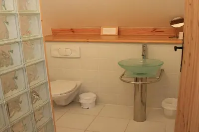 Salle de bains dans l'établissement L'Aide Frechu