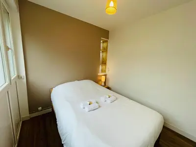 Un ou plusieurs lits dans un hébergement de l'établissement Wolk, Joli appt une chambre