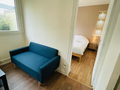 Un ou plusieurs lits dans un hébergement de l'établissement Wolk, Joli appt une chambre