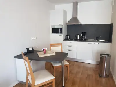 Cuisine ou kitchenette dans l'établissement Domitys Le Carrousel