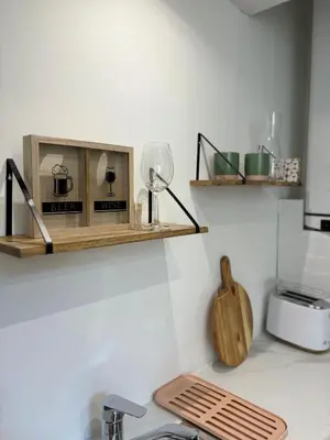 Cuisine ou kitchenette dans l'établissement Appartement terrasse au cœur de la ville