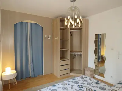 Un ou plusieurs lits dans un hébergement de l'établissement Maison calme proche mer