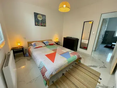 Un ou plusieurs lits dans un hébergement de l'établissement Jacuzzi privé 500m de la mer