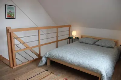 Un ou plusieurs lits dans un hébergement de l'établissement Borne arcade, Billard, Fléchettes & Sauna 6pers