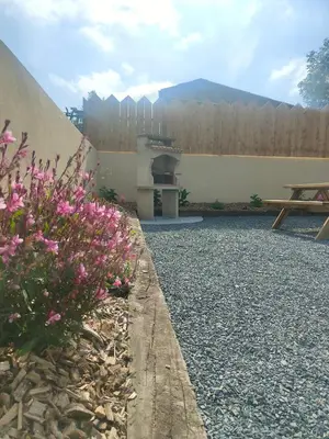 Jardin de l'établissement Gîte 6 personnes