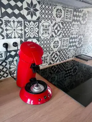 Cuisine ou kitchenette dans l'établissement Gîte rénové à Ravenoville