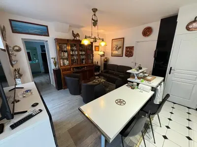 Coin salon dans l'établissement Appartement
