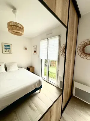 Un ou plusieurs lits dans un hébergement de l'établissement Maison à 100m de la mer