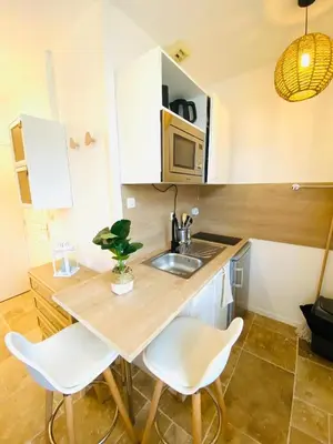 Cuisine ou kitchenette dans l'établissement Bienvenue à Santorin - Caen centre