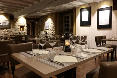 Coin salon dans l'établissement Auberge le John Steele