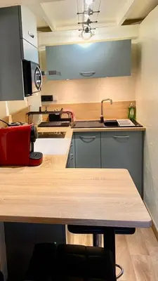 Cuisine ou kitchenette dans l'établissement Magnolia Home