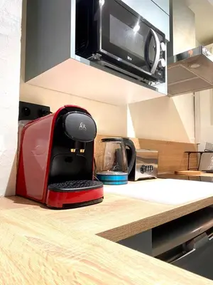 Cuisine ou kitchenette dans l'établissement Magnolia Home