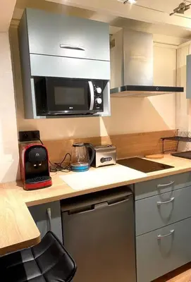 Cuisine ou kitchenette dans l'établissement Magnolia Home