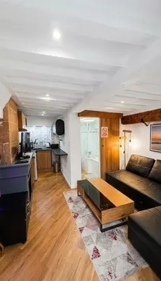 Cuisine ou kitchenette dans l'établissement L 'iris, studio à Caen