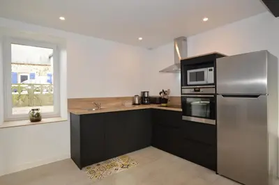 Cuisine ou kitchenette dans l'établissement Gite Cour du Bourg - Baie du Mont Saint Michel