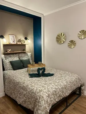 Un ou plusieurs lits dans un hébergement de l'établissement La Suite Émeraude - Cosy, chic et bord de mer