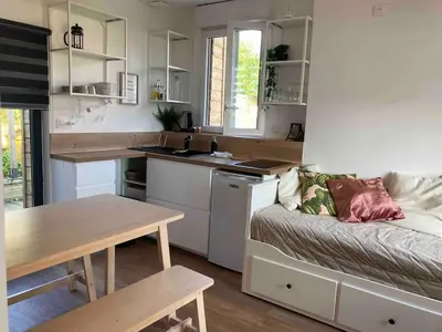 Cuisine ou kitchenette dans l'établissement Maisonnette Individuelle