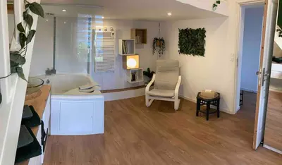 Coin salon dans l'établissement Maisonnette Individuelle