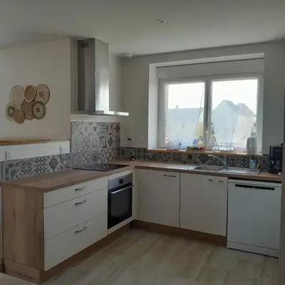 Cuisine ou kitchenette dans l'établissement La Grange aux Abeilles 3