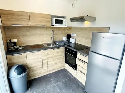 Cuisine ou kitchenette dans l'établissement Abaca YourHostHelper