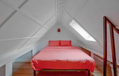 Un ou plusieurs lits dans un hébergement de l'établissement 1 Bedroom Cozy Apartment In Carolles