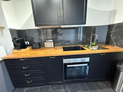 Cuisine ou kitchenette dans l'établissement Le Rossignol 1 er etage