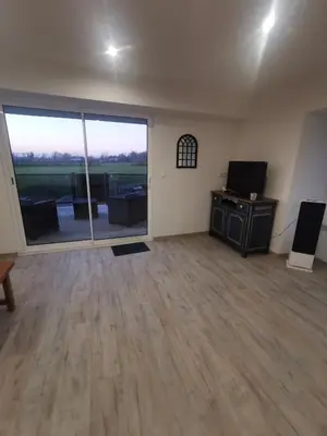Télévision ou salle de divertissement dans l'établissement Gîte des Marais