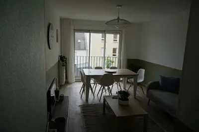 Coin salon dans l'établissement Appartement confortable