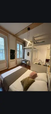 Un ou plusieurs lits dans un hébergement de l'établissement Joli studio centre-ville Caen
