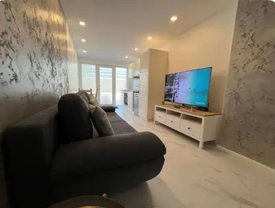 Télévision ou salle de divertissement dans l'établissement IL punto