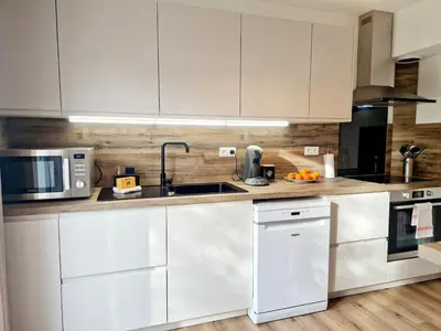 Cuisine ou kitchenette dans l'établissement Les Oyats