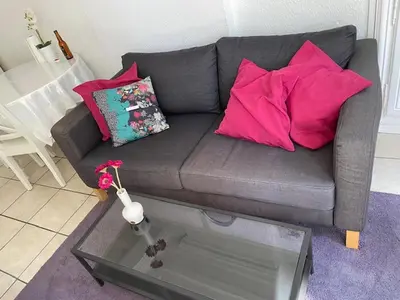 Coin salon dans l'établissement Apartment in Bayeux near D-Day Beaches