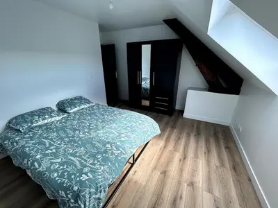 Un ou plusieurs lits dans un hébergement de l'établissement Modern renovated apartment #8 with 7pers mezzanine