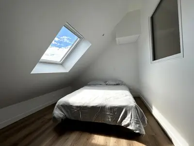 Un ou plusieurs lits dans un hébergement de l'établissement Modern renovated apartment #8 with 7pers mezzanine